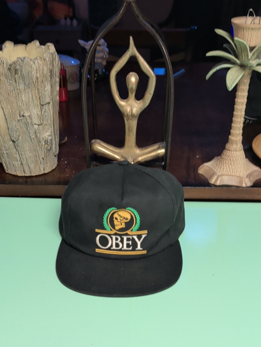 Obey Black Cap with Gold and Green Crest Embroidery